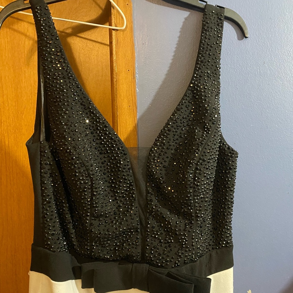 Black and white long dress. Worn once for a pageant. Has some mystery spots